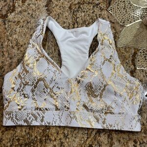 Woman’s Fabletics Gold and White Snake Print Sports Bra